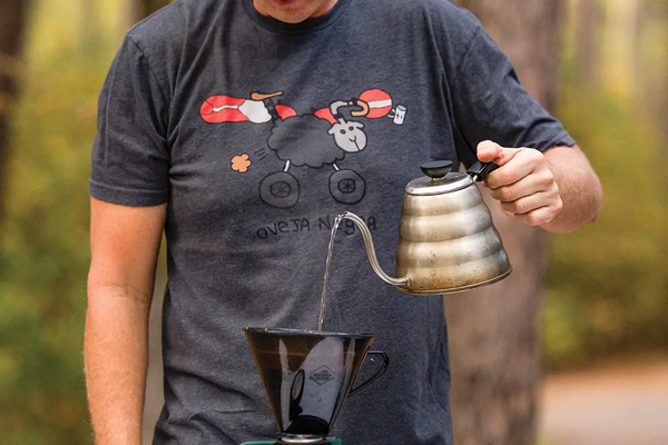 Man pouring making coffee at a Texas State Park camp site
