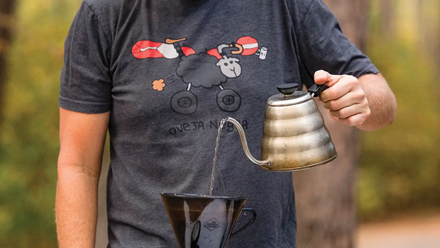 Man pouring making coffee at a Texas State Park camp site
