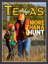 October 2013 Cover - Father and Child walking through a field while hunting - Title: More than a Hunt