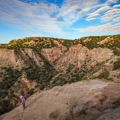 Hiker on the rim of Palo Duro Canyon