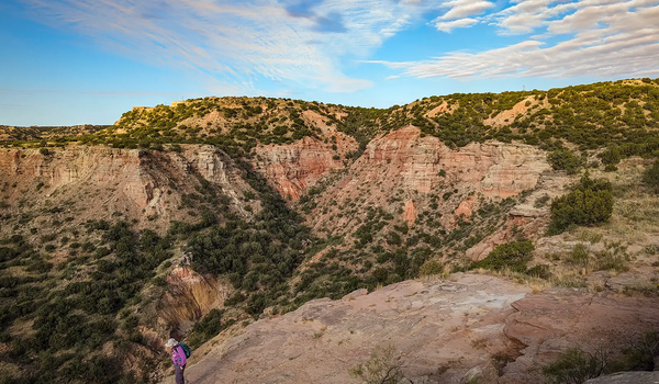 Hiker on the rim of Palo Duro Canyon