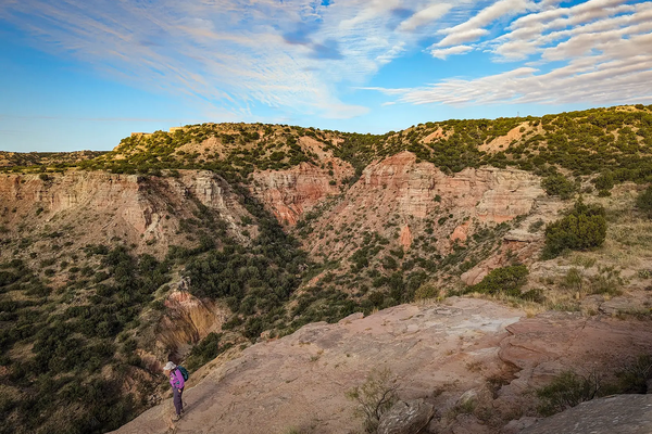 Hiker on the rim of Palo Duro Canyon