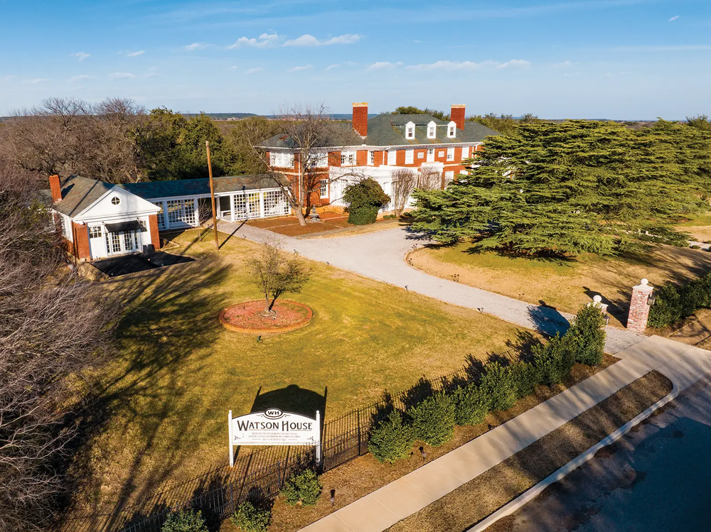 The red brick Watson House at Palo Pinto