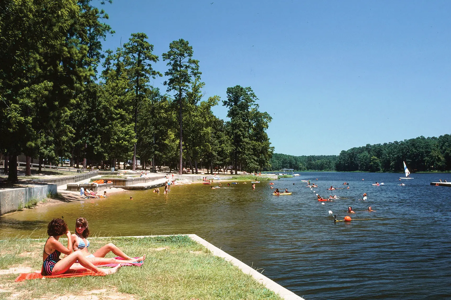 People Sunbathing at Lake Raven in Huntsville State Park