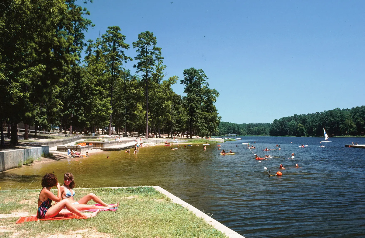 People Sunbathing at Lake Raven in Huntsville State Park