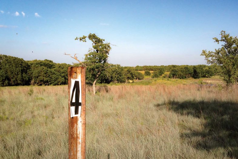 Post with the number 4 in a field.