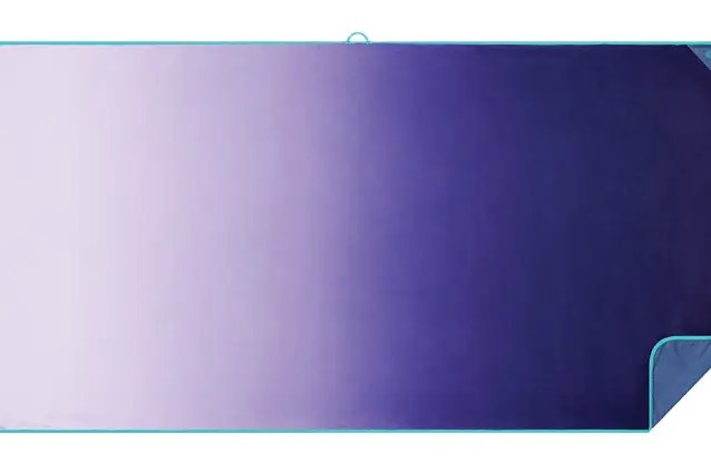 Rumpl Tech standard towel in lavender fade.