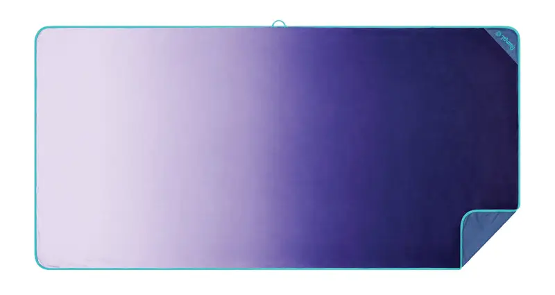 Rumpl Tech standard towel in lavender fade.