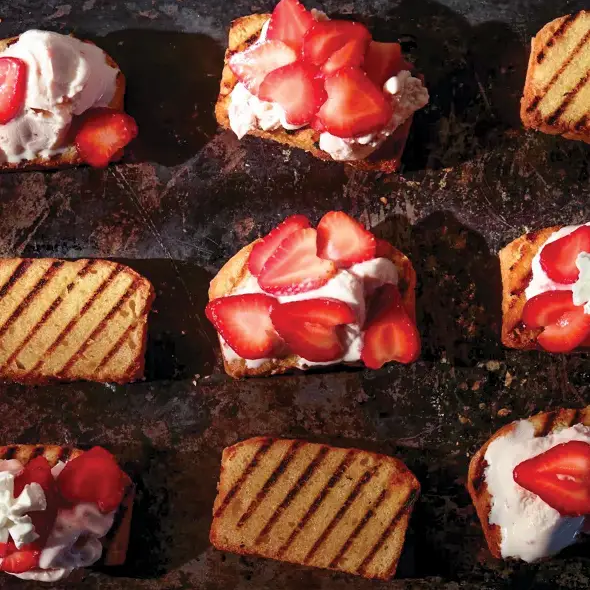Strawberry Shortcakes made with grilled pound cake, whipped cream, and strawberries.