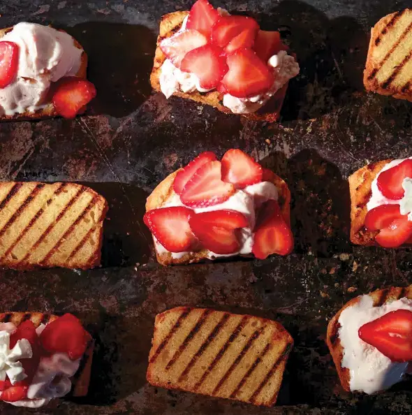 Strawberry Shortcakes made with grilled pound cake, whipped cream, and strawberries.