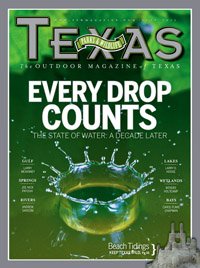 July 2011 Cover - Large drop of water falling in a puddle - Title: Every Drop Counts