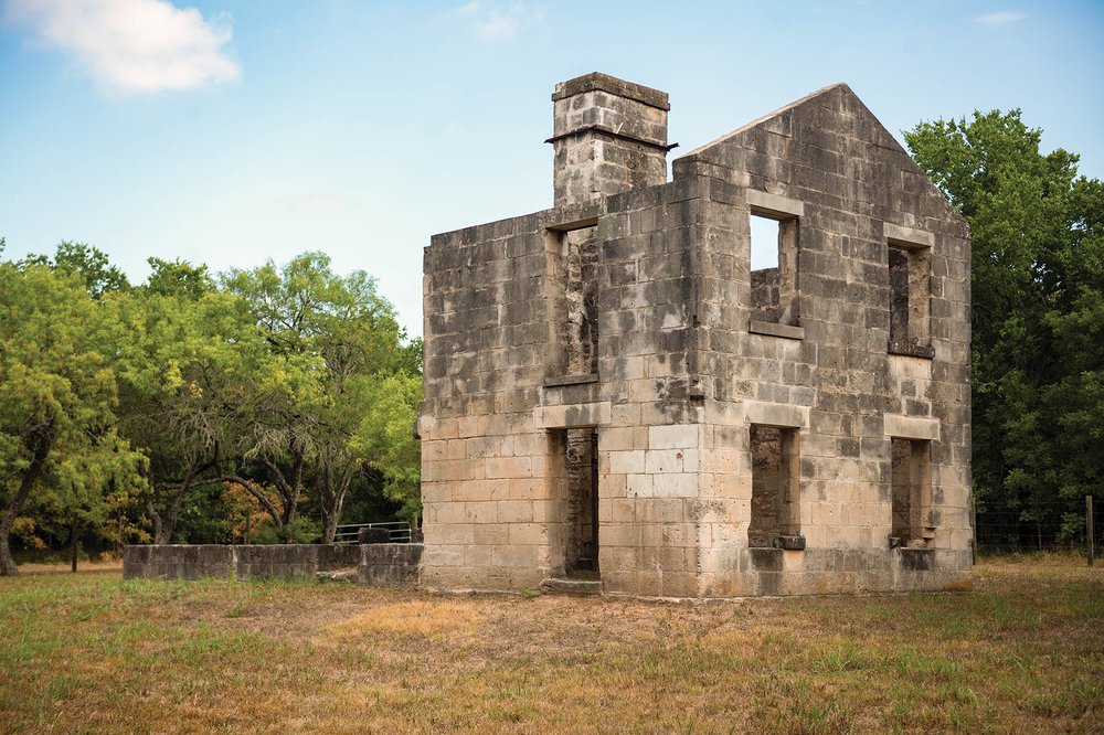 The remains of a cinderblock home.