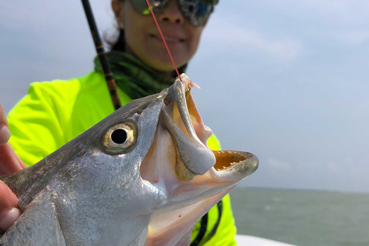 Woman fishing for speckled seatrout