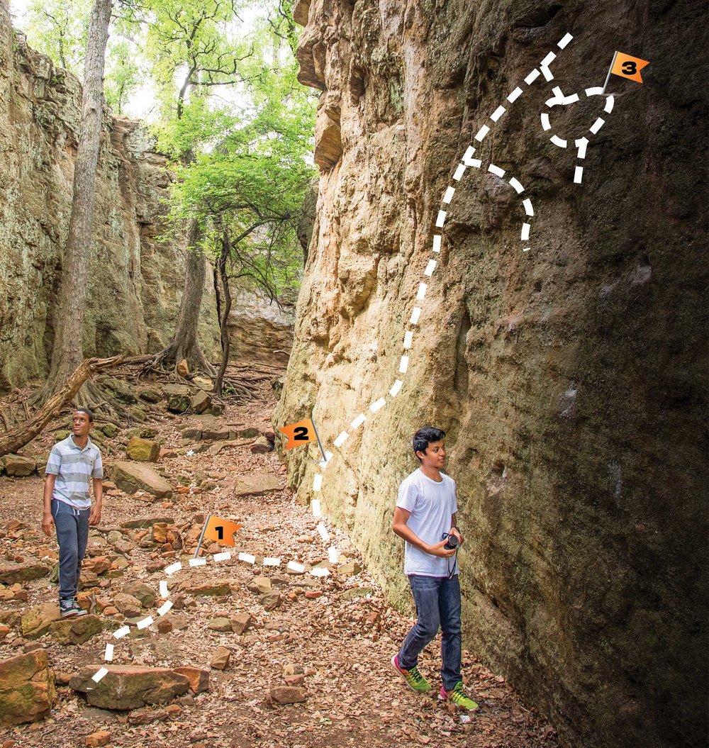 Two young adults walking a trail. A map of the trail is superimposed on the photo.