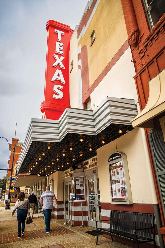 Waxahachie Cinema with a large red Texas sign