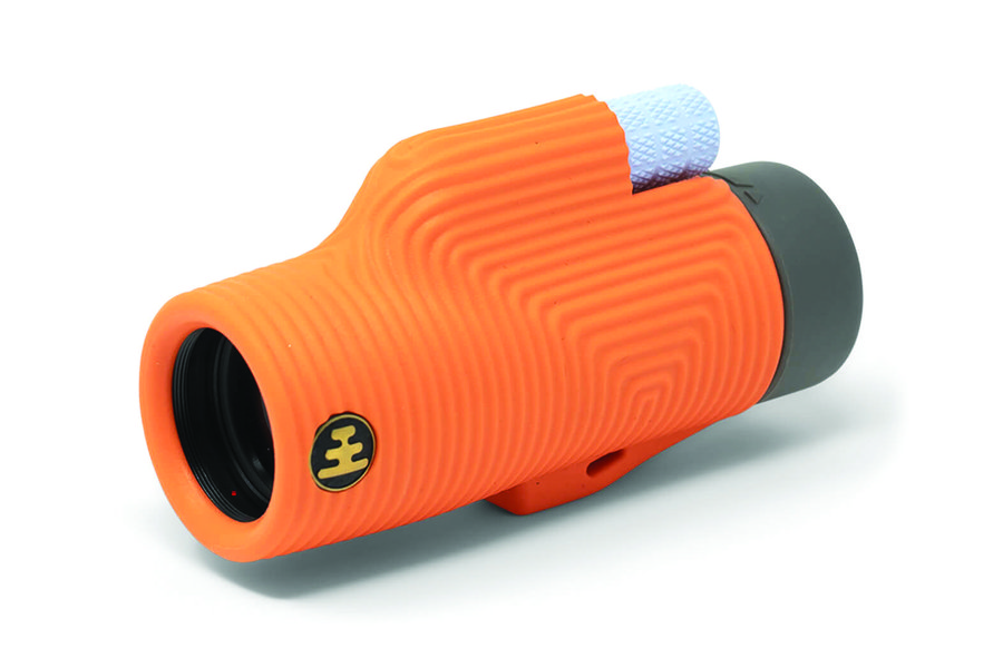 An orange Zoom Tube monocular by Nocs Provisions.