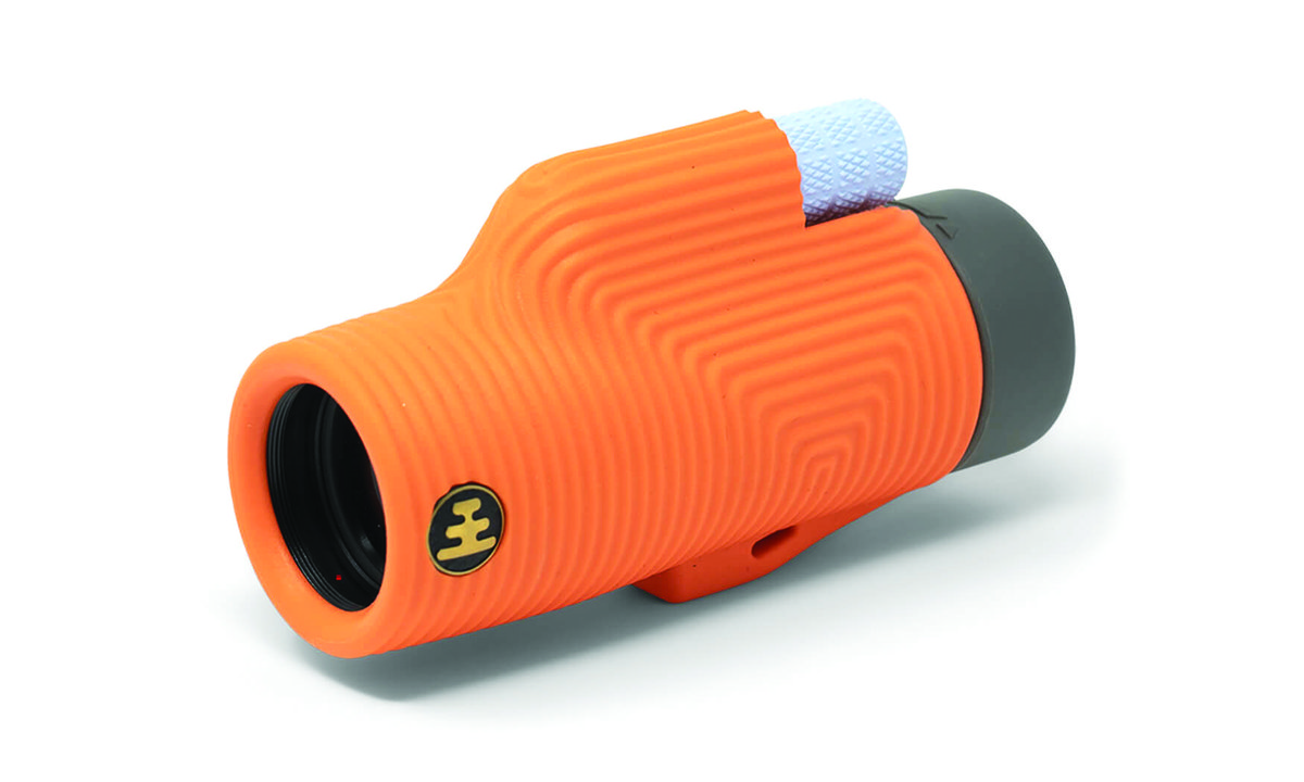An orange Zoom Tube monocular by Nocs Provisions.