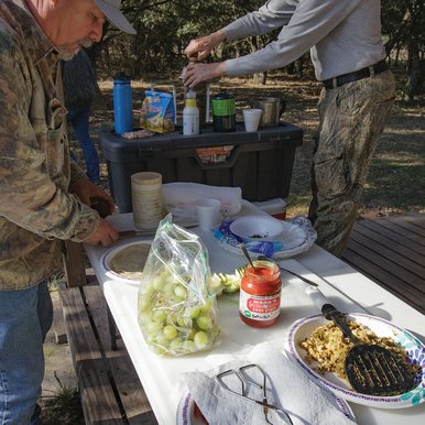Preparing camp breakfast