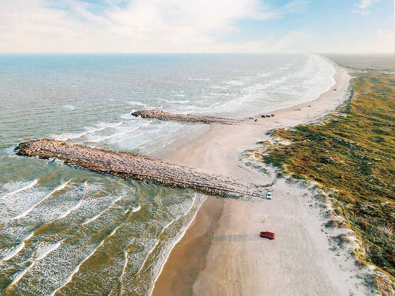 An aerial view of the beach at Mustang Island along the Texas gulf coast