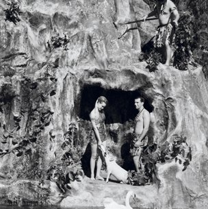 Aquamaids and Polynesian-themed show on a rocky and cavernous hill at Aquarena