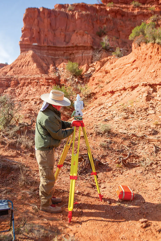archiologist setting up at bison jump at caprock canyons