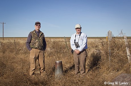 Greg Lasley, left, and Chuck Sexton standing at the spot where Texas, Oklahoma and New Mexico meet.