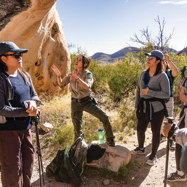 Hueco Tanks park ranger guiding a group through the state park