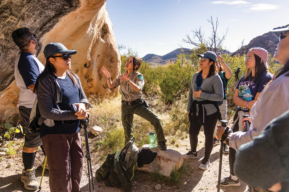 Hueco Tanks park ranger guiding a group through the state park