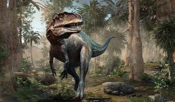 A dinosaur walks across a prehistoric landscape