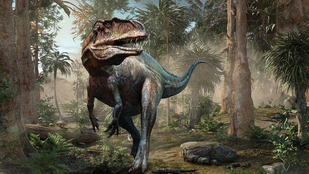 A dinosaur walks across a prehistoric landscape