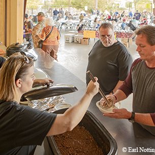 Hunters gather at the community pavilion for a chili lunch.