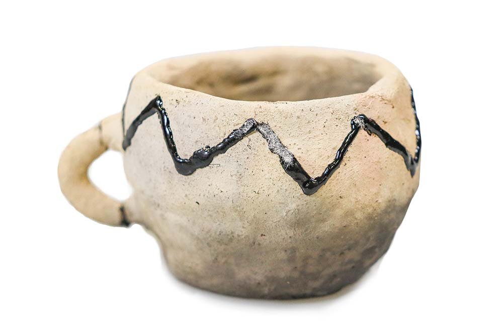 A Goliad ceramic cup