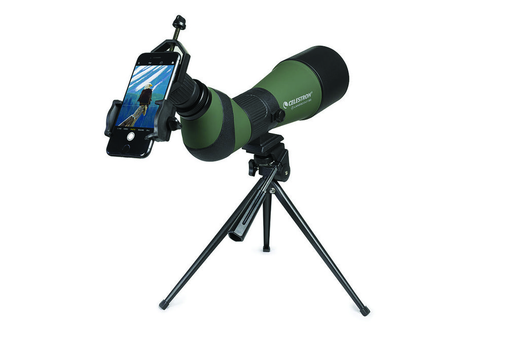 A phone hooked up to a spotting scope