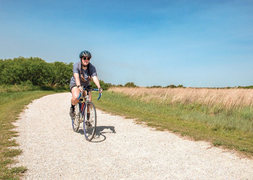 Biker rides on the Lost Creek trailway