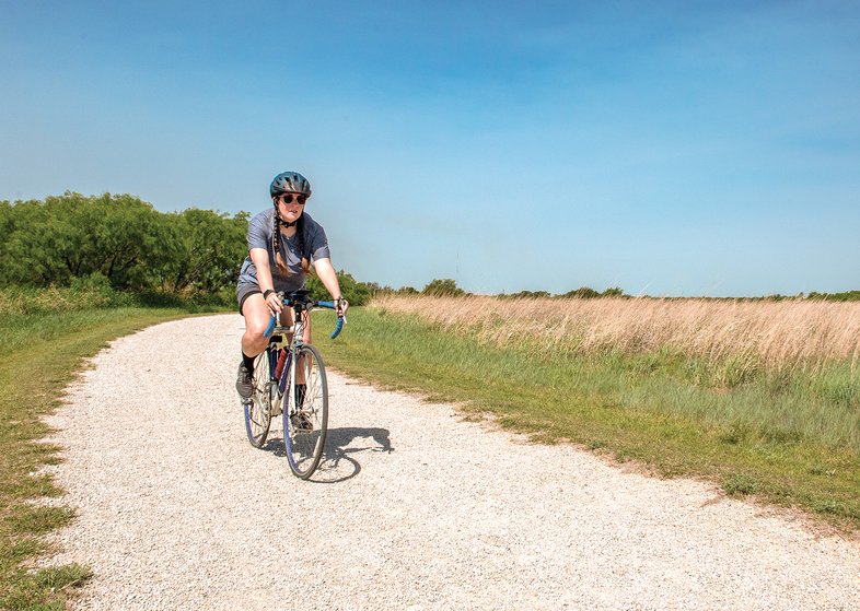 Biker rides on the Lost Creek trailway