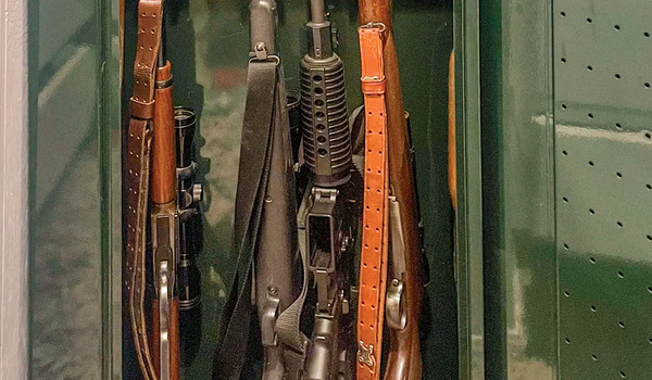 store guns safely in a green gun safe