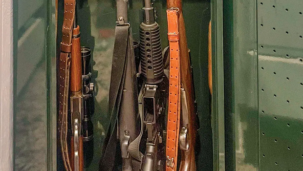store guns safely in a green gun safe