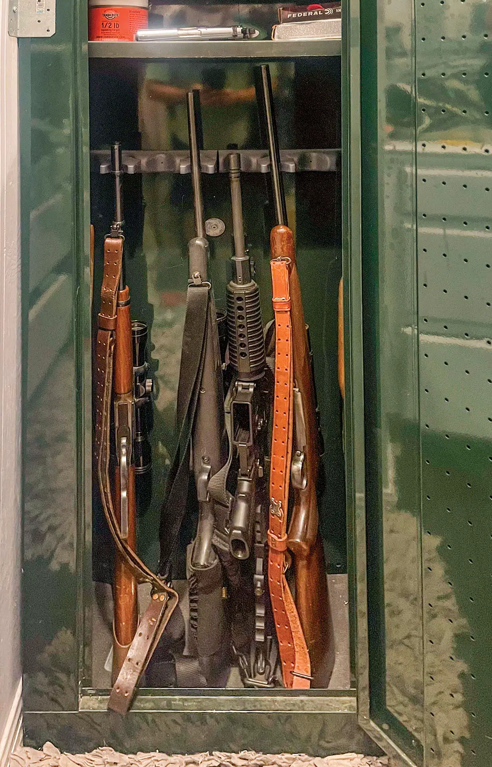 store guns safely in a green gun safe