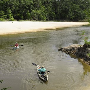 village creek state park 2 kayaks with paddlers