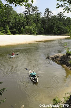 village creek state park 2 kayaks with paddlers
